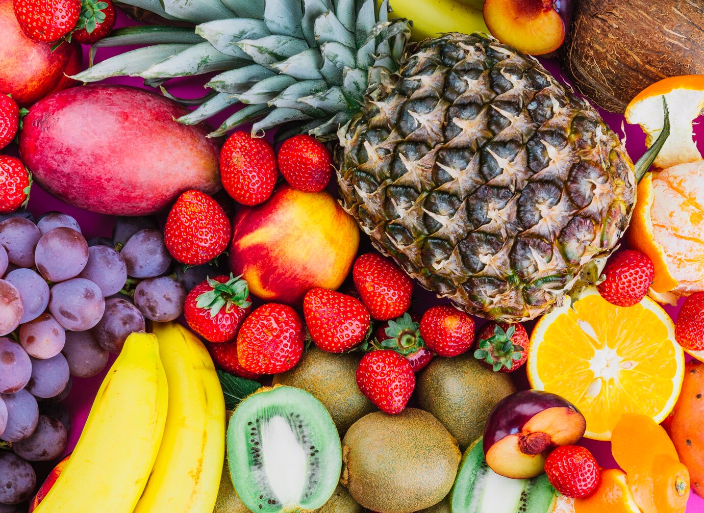 grapes_strawberries_pineapple_kiwi_apricot_banana_whole_pineapple